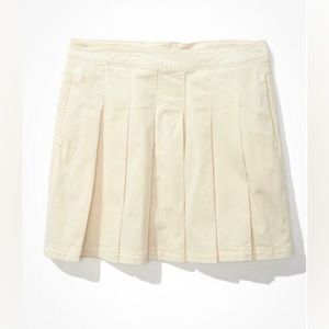 Pleated beige mini skirt